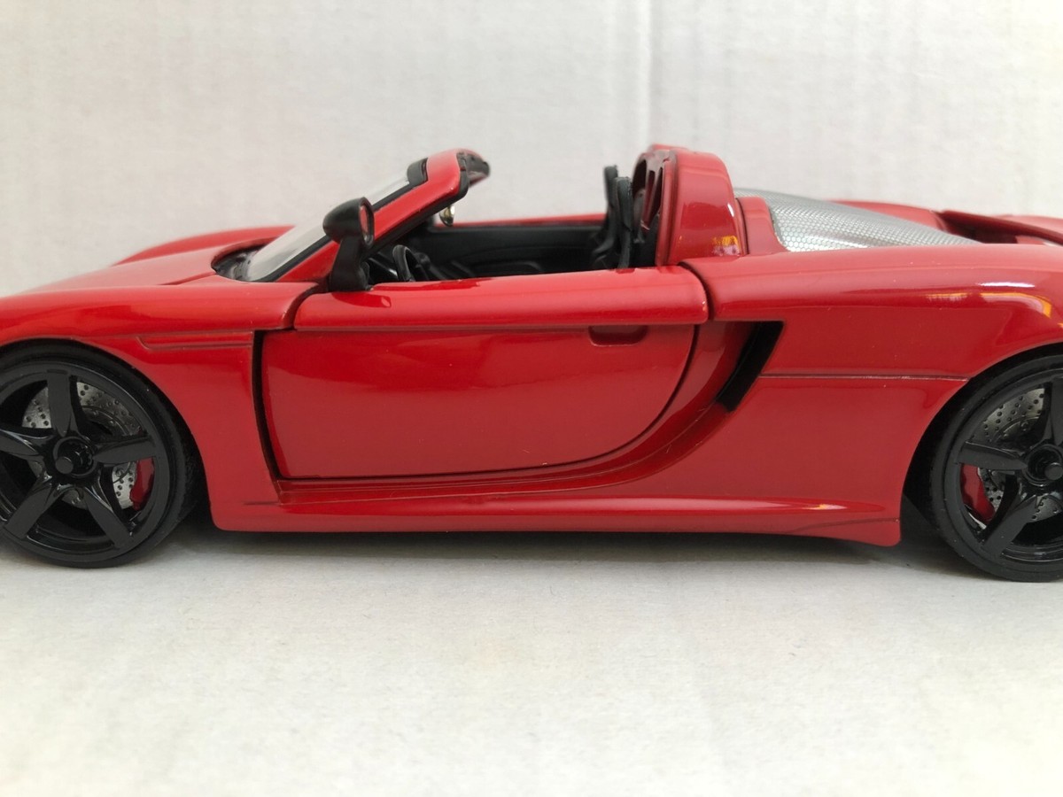 JADA 2005 PORSCHE CARRERA GT RED W/ BLACK WHEELS 1:24 DIECAST