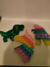 T Rex, Godzilla , And Unicorn Pop It Fidget Toy New