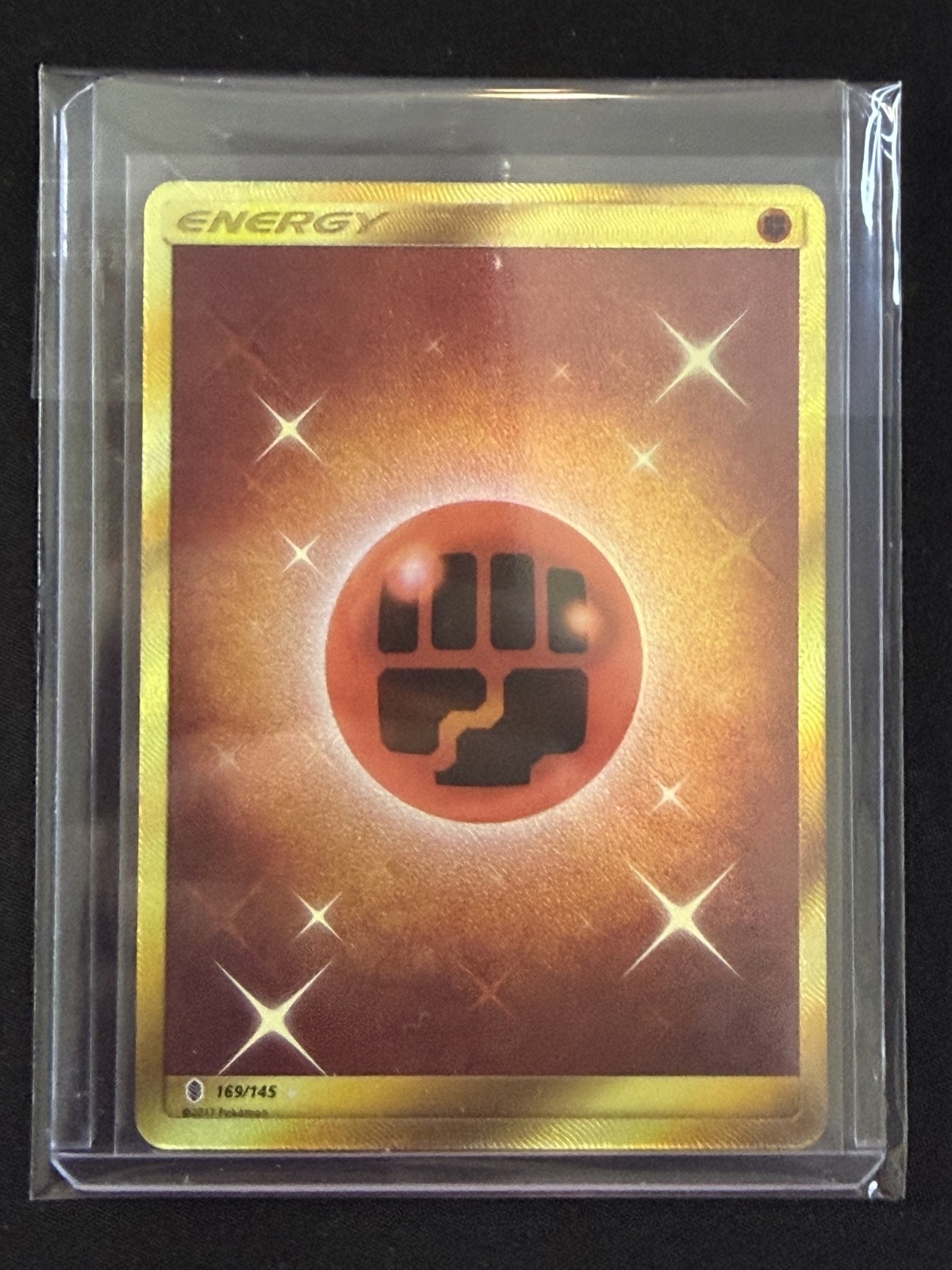 Pokemon Fighting Energy 169/145 Secret Rare Gold Holo Guardians Rising NM