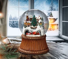 The San Francisco Music Box Company Rotating Train Mountain Village Snow Globe
