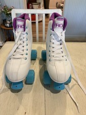 Patines cuádruples Roller Derby Roller Star 600 para mujer talla 8 blanco azul Top