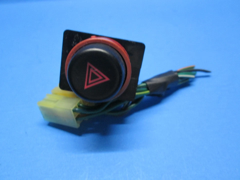 Botón interruptor de peligro intermitente de emergencia Mitsubishi Eclipse Talon 1990-1994 OEM Foto 2 de 4