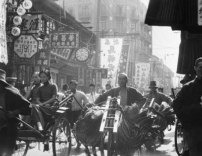 Nanjing Road the busy commercial thoroughfare of Shanghai in Septe- Old Photo
