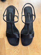 Woman’s Next Satin black diamanté strap evening shoes.
