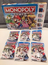 Monopoly Gamer + 6 Power Packs Fire & Tanooki Mario, Rosalina, Boo, Luigi, Toad