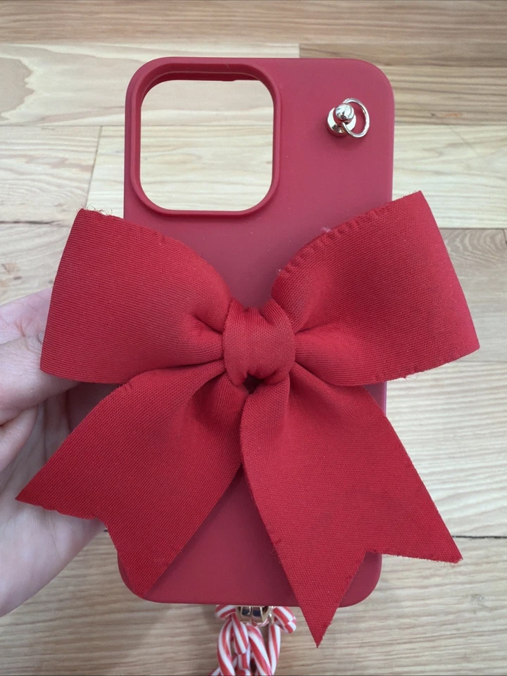 Muñequera Heyday Red Bow Iphone 15 Pro Max con bastón de caramelo a rayas Navidad Foto 2 de 4
