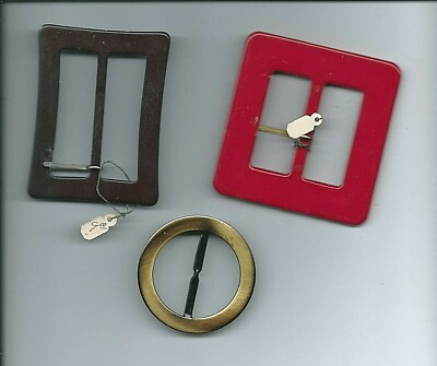 vintage Belt Buckles Scarf Holders black metal red bakelite? retro