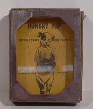 A C Gilbert Hungry Pup hand-held skill game