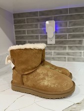 UGG Mini Bailey Bow Glimmer boots Women  s Size 6 Color Chestnut.