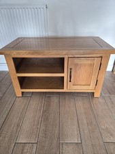 Solid Oak TV Stand With 2 Shelves And One Copboard.