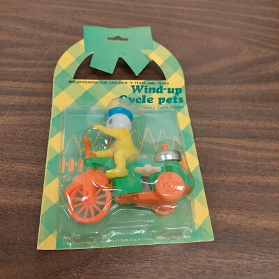 Vintage Chick wind up Cycle pets Easter unlimited, 4 1/2'' tall Toy Bicycle New