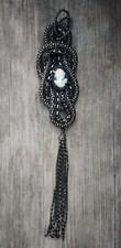 Vintage metallic pendant with cameo