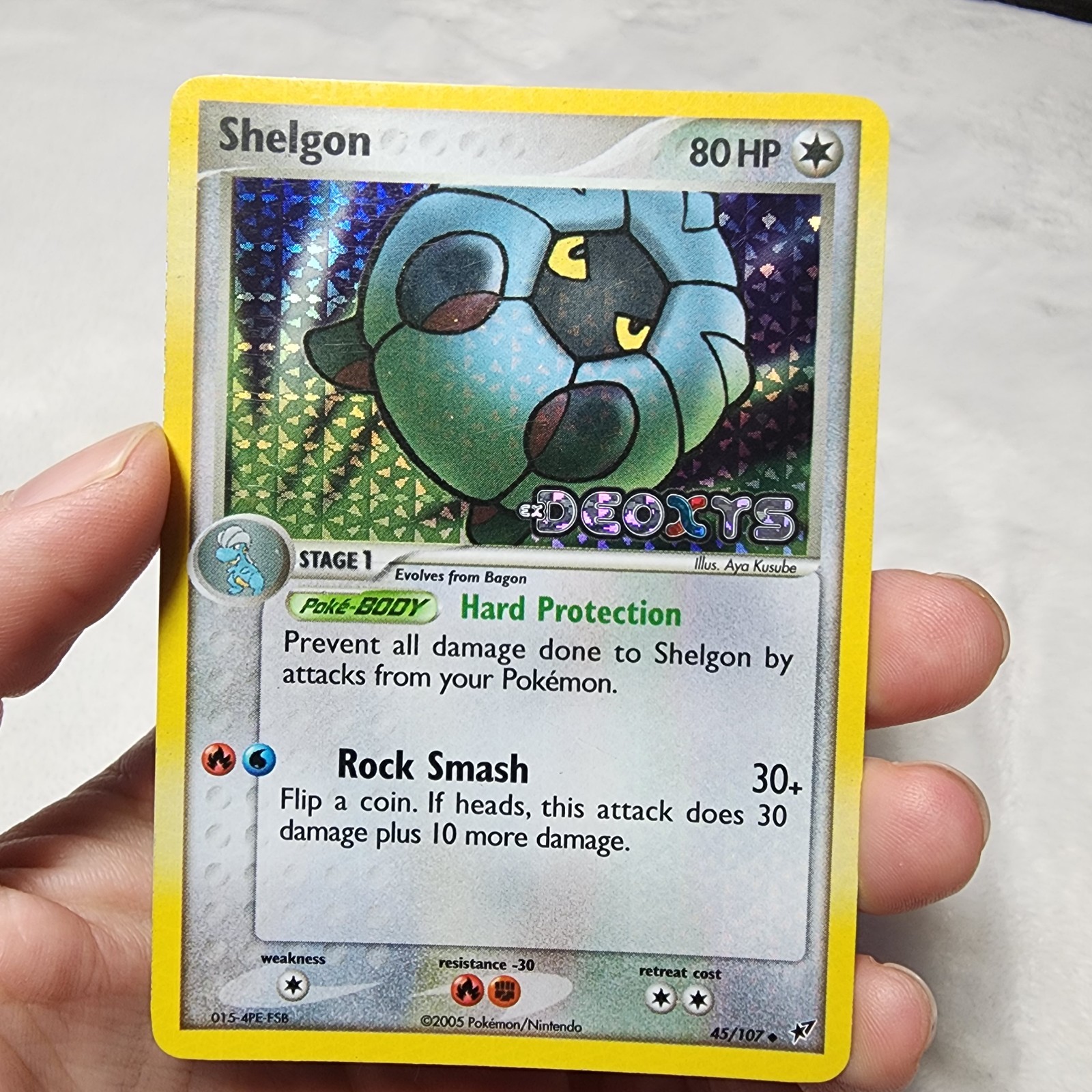 Pokemon Card - Shelgon Deoxys 45/107 Reverse Holo Uncommon Stamped Holo Bleed
