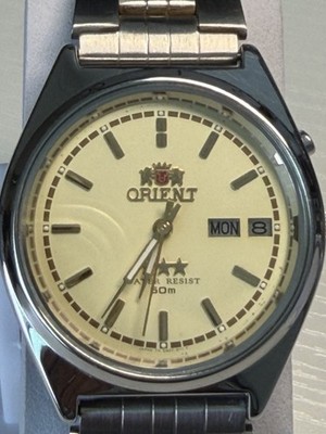 Orient 3 Star Quartz Day/Date 50m Gold Dial Stainless Steel Bracelet Watch