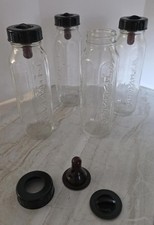 VTG Evenflo Baby Glass Bottles with Nipples and Caps - Set of 4