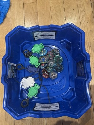 Beyblade Battle Set Arena with five launchers and 11 different Beyblades. 