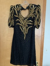 Woman’s Cocktail Dress. Size Large. Dress worn 1 time. Very pretty.