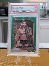2022 Prizm WWE Drew McIntyre WWE Gold - Green Pulsar /25 PSA 9