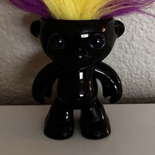 WowWee Black Troll Doll with Yellow and Purple Straight Hair