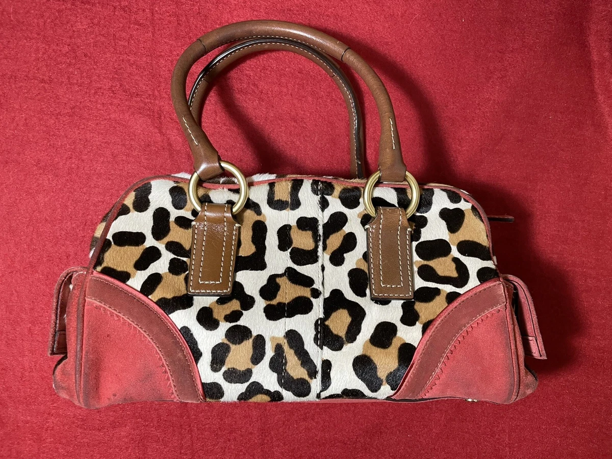 Coach ocelot hotsell leopard purse