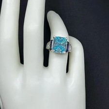 Sterling silver 6 carat blue stone ring with sapphires