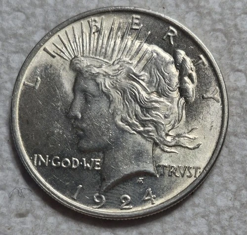 1924 P Peace Silver Dollar. Estimated Uncirculated Mint State 63. Video A0186.