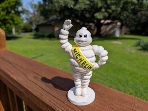 CAST IRON 7" MICHELIN MAN STANDING WAVING PROMOTIONAL MONEY COIN BANK