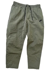 Mens Size XL Nike Sportswear Tech Woven Unlined Commuter Pants Olive DQ4343 222