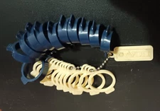 Vintage Avon salesperson ring sizing rings for narrow and wide bands size 3-13