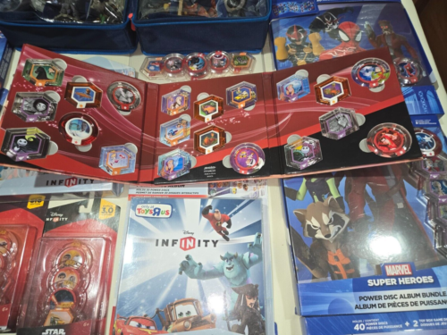 Disney Infinity Complete Album Power Discs Toys R US TRU NEW - Picture 8 of 23