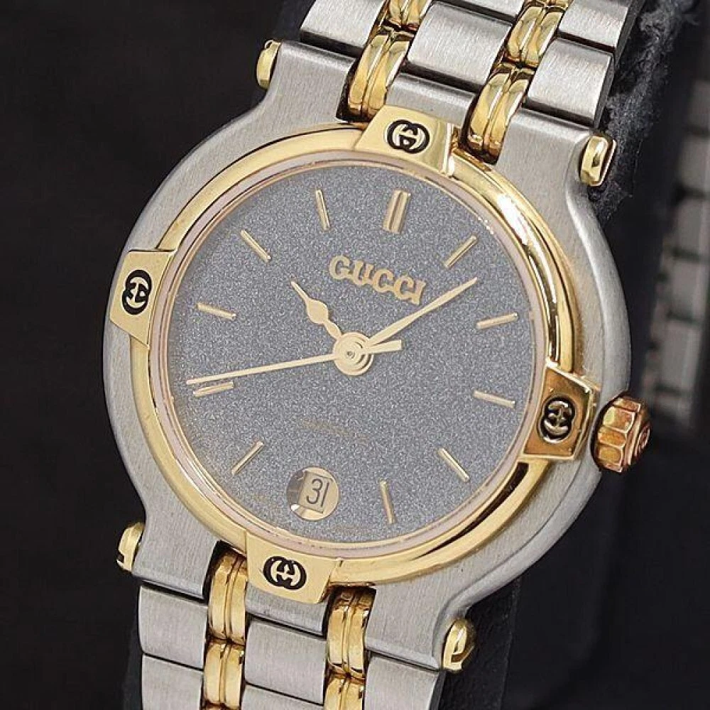 Montre femme Gucci 9000L cadran noir quartz vintage