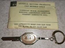 Vintage Uncut 1969 General Motors GM Key Blank Key Chain Cadillac Buick Pontiac