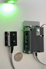 Single Frequency Green Laser with Meter-Long Coherence Length