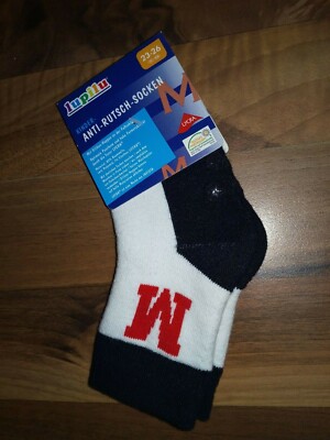 Kinder-Anti-Rutschsocken,23-26,weiß/Schwarz mit M-Aufdruck,SilikonnoppenNEU&OVP!