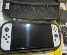 Nintendo switch oled console and official charger