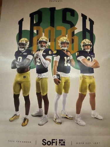 2026 NOTRE DAME FIGHTING IRISH YEARBOOK cover with gold helmets, green jerseys, and four players in white pants.