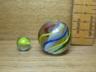 Large Antique Handmade Swirl Marble with rough Pontil marks . Approx 3.5cm