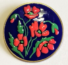 Broche vintage ronde bronze émaux bleu rouge Coquelicot signé A. Colliot Suisse
