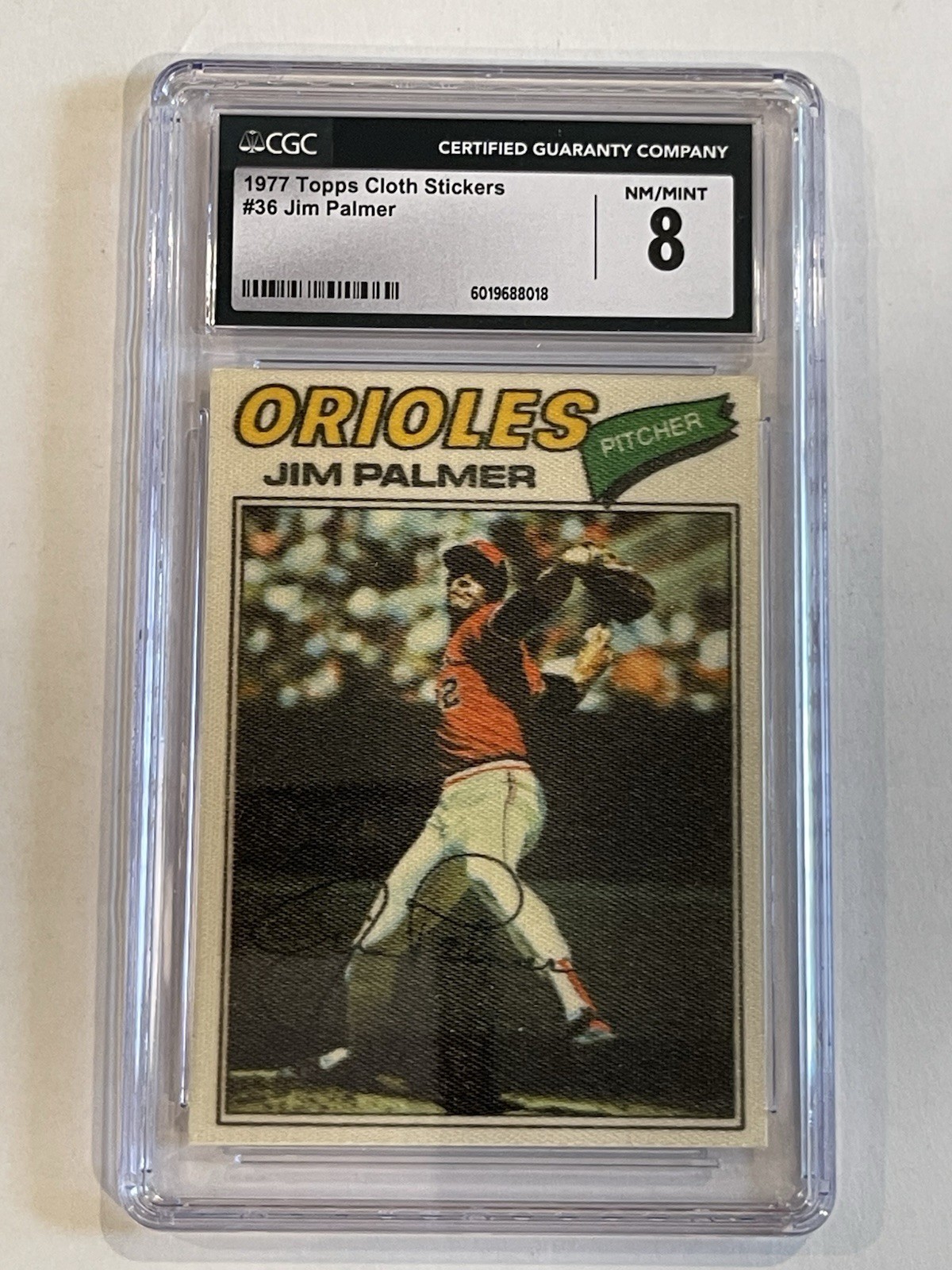 Jim Palmer #36 Baseball Cards 1977 Topps Cloth Stickers trading card — raw and PSA graded price guide