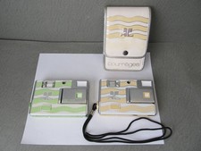 Pair of Vintage Minolta Courreges AC 101 Disc Cameras