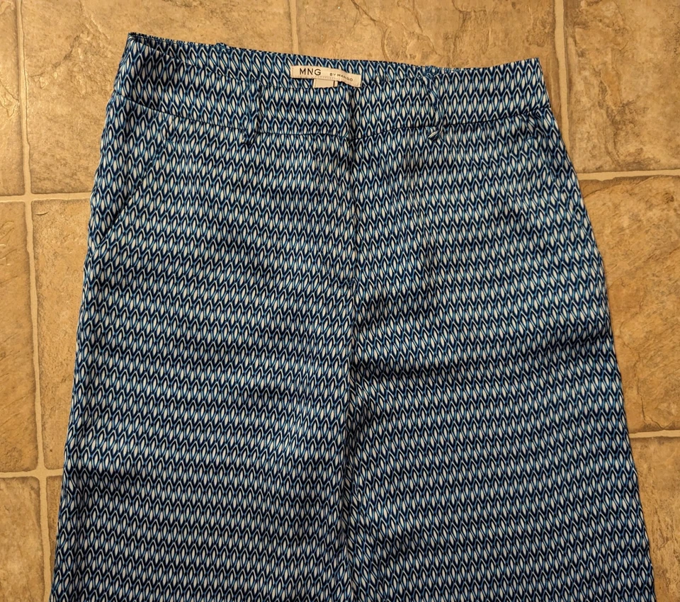 Pantalones semi transparentes 1976 nuevos con etiquetas MNG By Mango talla 4 100 % poliéster azul estampado diamante Foto 4 de 4