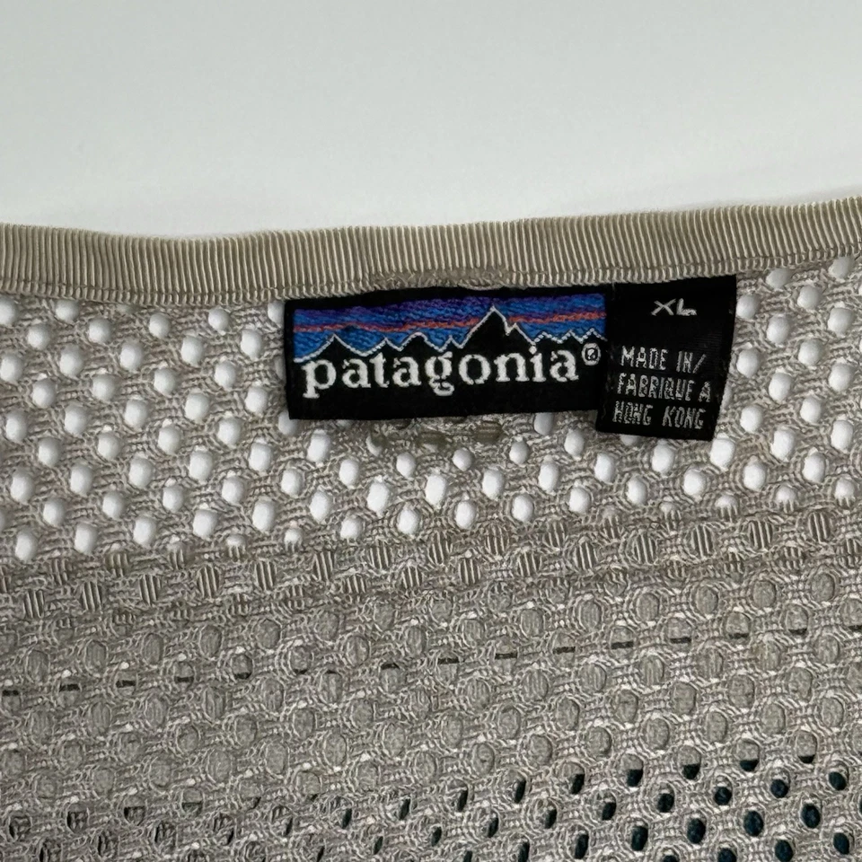 Chaleco de pesca Patagonia Shortie para hombre talla XL mosca al aire libre senderismo azul/bronceado de colección Foto 3 de 4