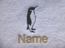 CHILD'S PINK HOODED ROBE embroidered with a PENGUIN design and Personalised Name