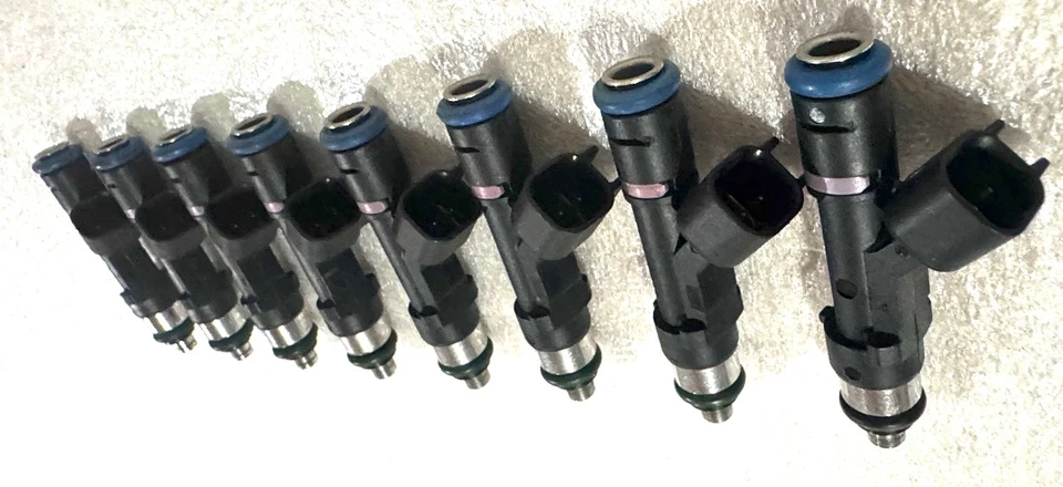Inyectores de combustible originales Bosch 27 lb de 12 orificios actualización 8x Jeep Dodge 4,7 L 5,2 L 5,9 L Foto 4 de 4