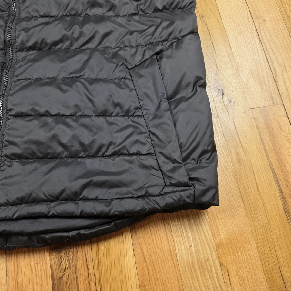 Chaleco acolchado negro Champion para hombre talla XXL cremallera bolsillos delanteros Foto 3 de 4