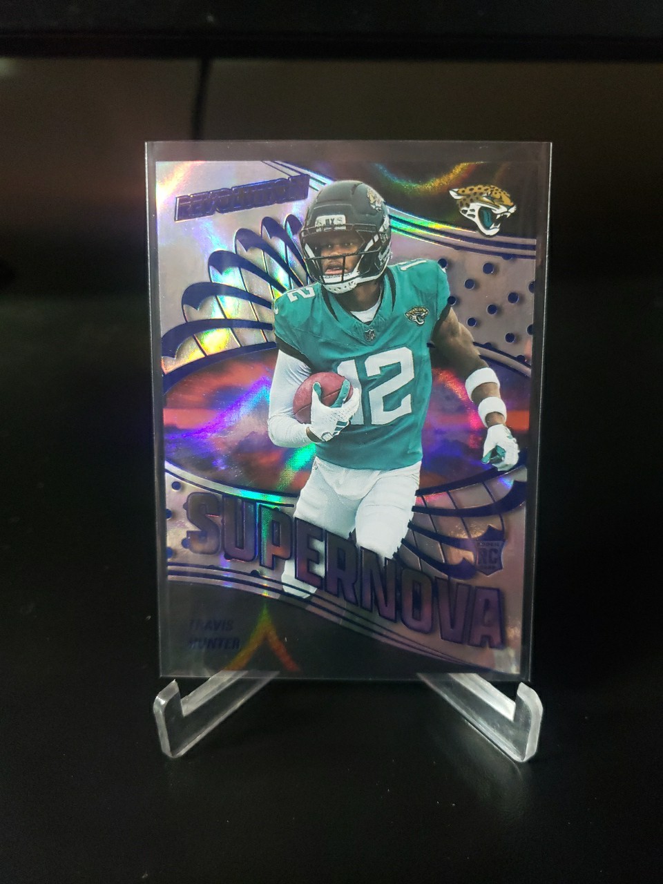 Travis Hunter 2025 Revolution Rookie Supernova Infinite 3/8 SSP. Jaguars