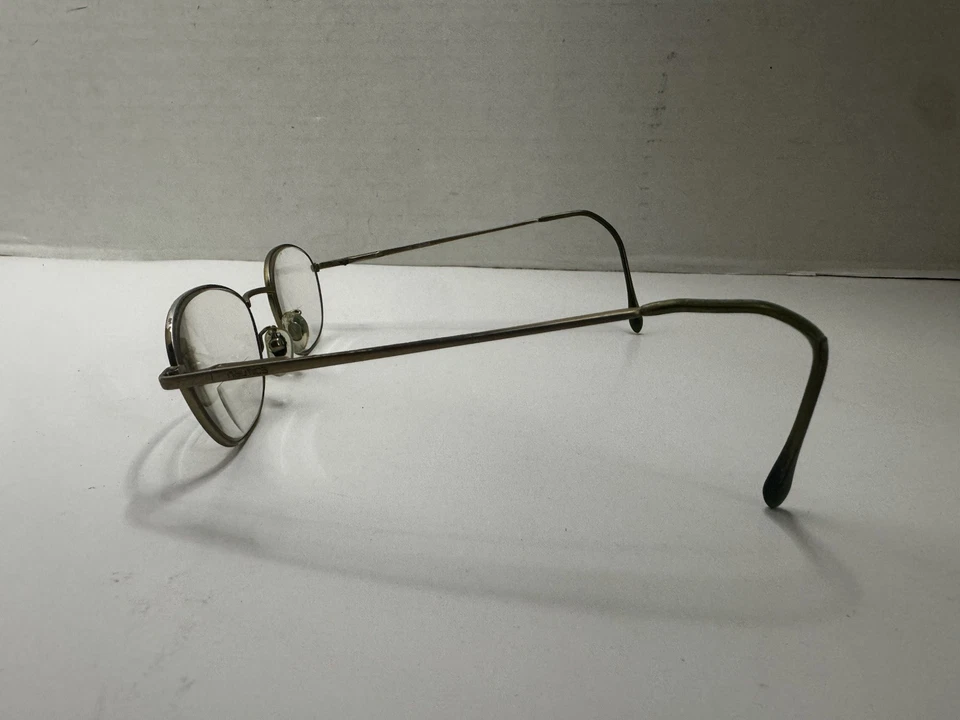 Marcos de gafas de metal ovalado dorado Nautica N7106 042 52-19-145 bisagras de resorte Foto 3 de 4