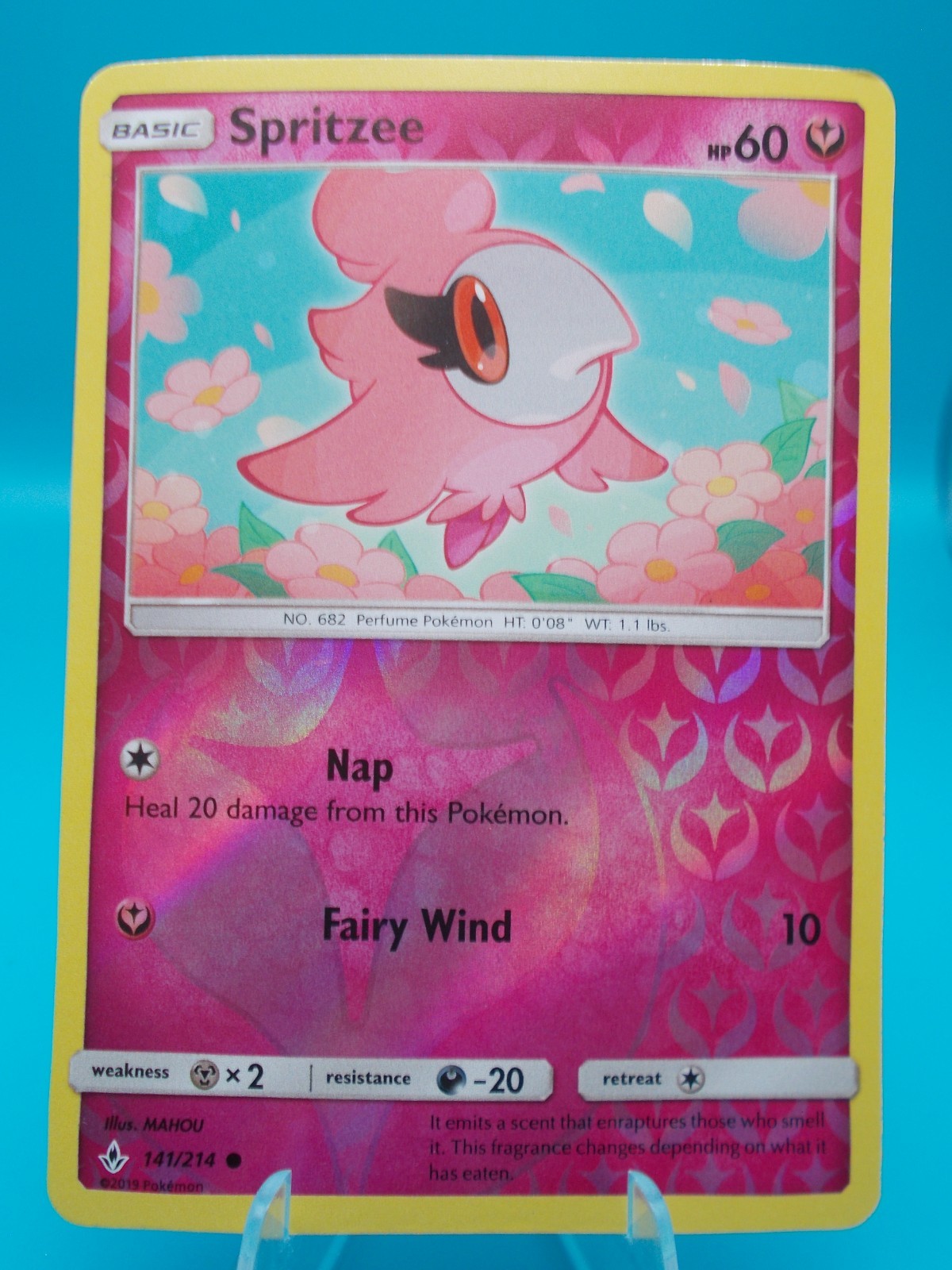 Spritzee 141/214 Sm-Unbroken Bonds Pokémon TCG Reverse Holo Lightly Played