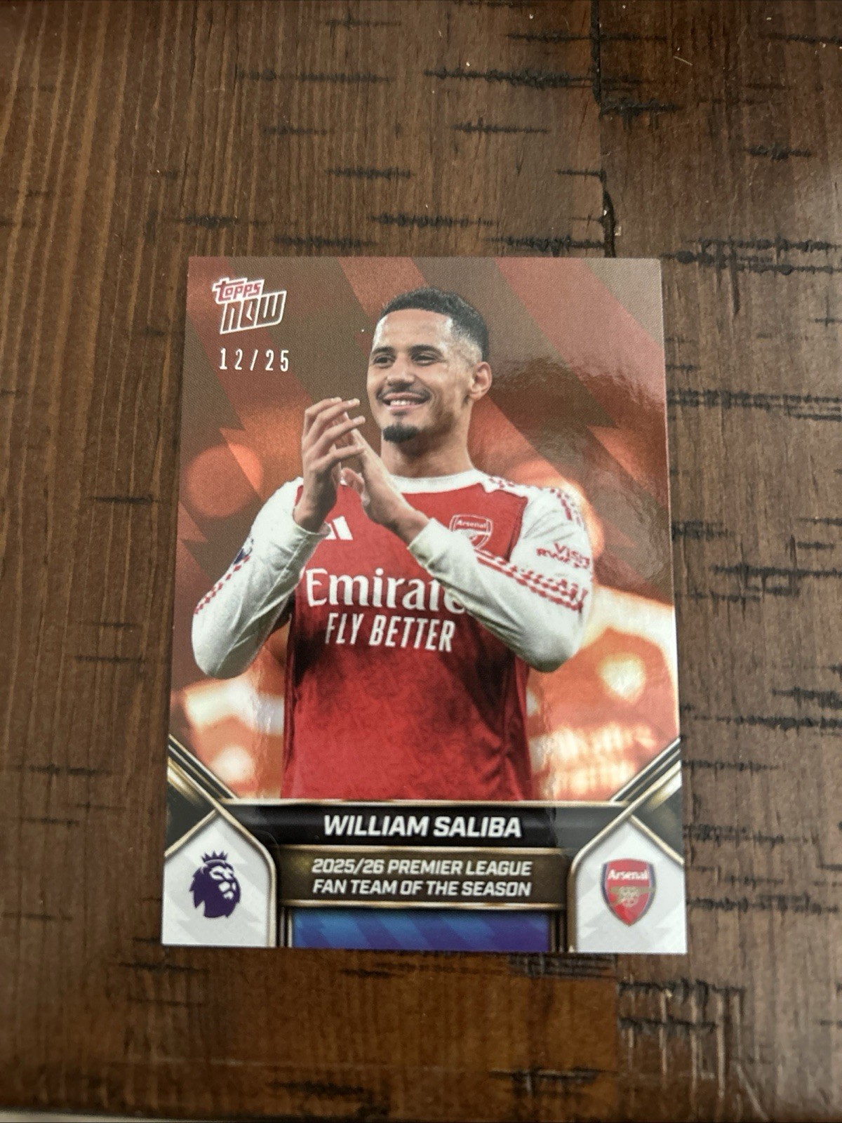 William Saliba 2025-26 Topps Now Premier Leauge Team of the Season Orange /25
