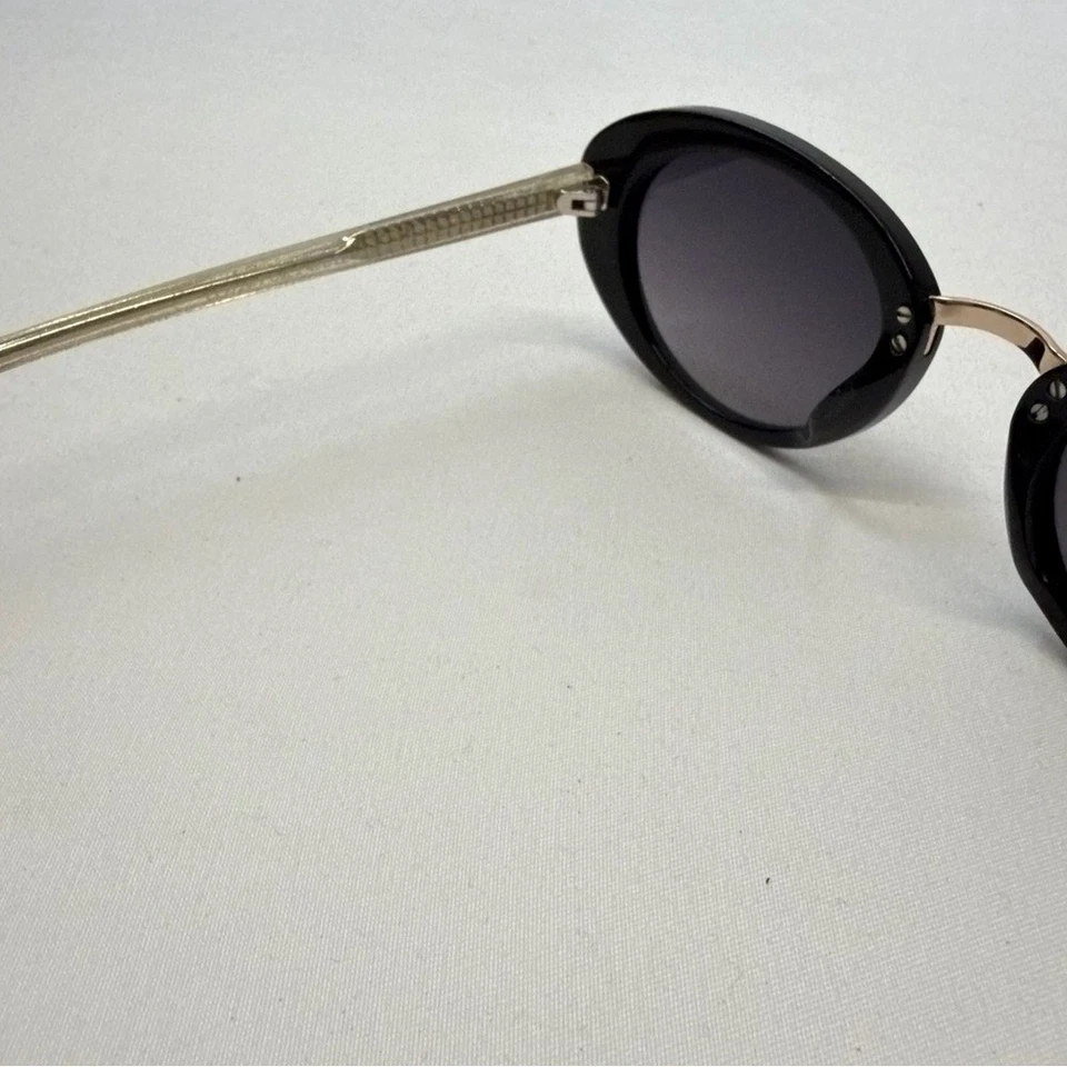 Gafas de sol para mujer Carolina Lemke marco negro ovalado dorado brillo brazos hechos a mano Foto 4 de 4